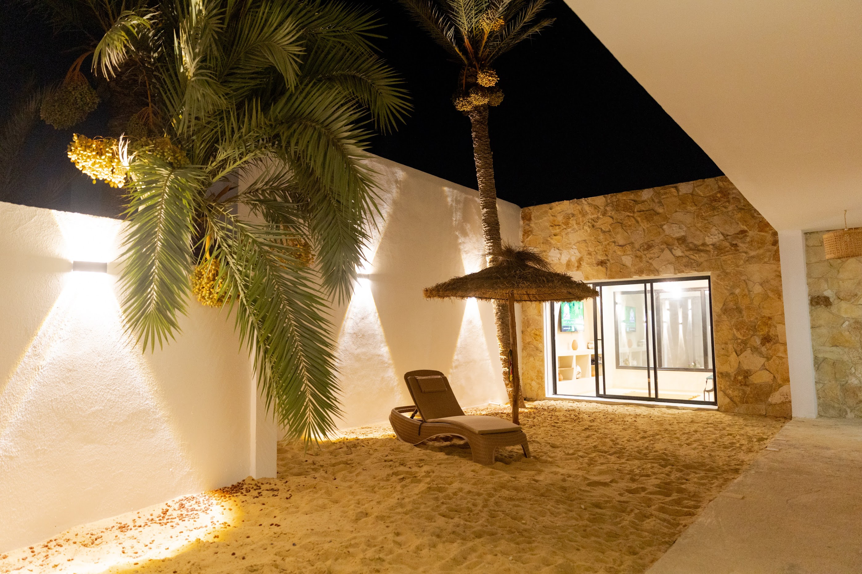 Villa Opale at Ethic Village Djerba in May-June — rear terrace with hammock, sand and palm tree